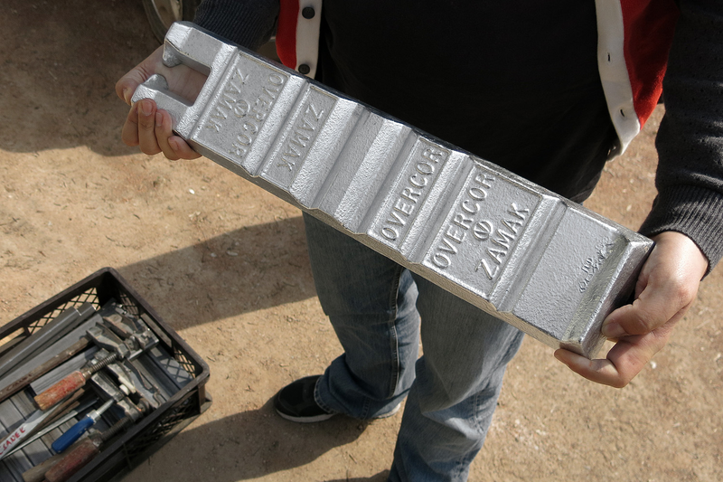 Illustration for article titled Casting Molten Metal On Wood With a Hungarian Design Master